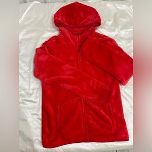 Fuzzy red jacket with hood.